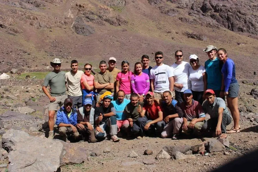 A trekking group with their Berber guides in the High Atlas
