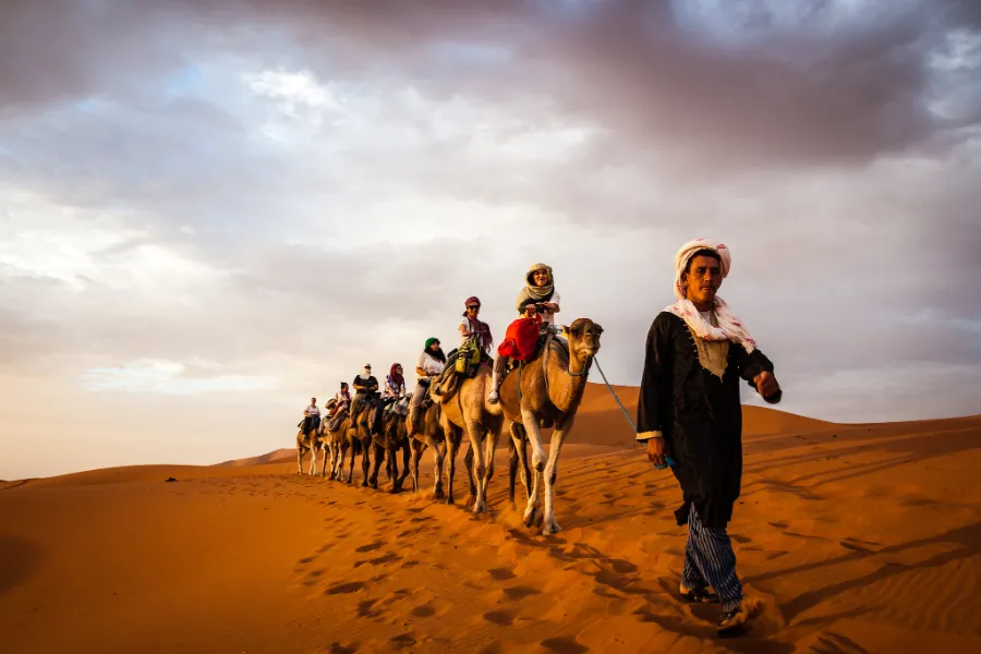 Trekkers and Berber mountain life in the High Atlas, Morocco