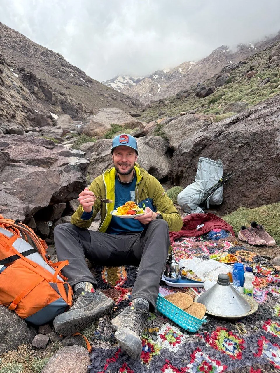 A hot cooked lunch served on a Berber rug in a High Atlas valley