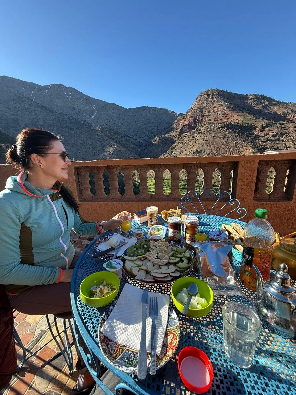 Breakfast on a Berber guesthouse terrace with High Atlas mountain views